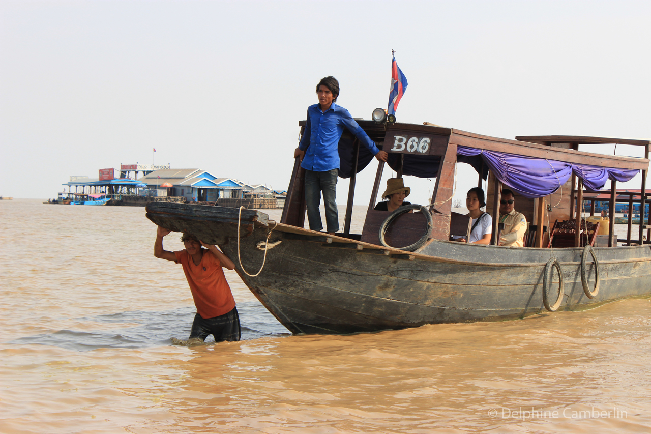 Local boat ferry on Tonle Sap, Cambodia — local transport