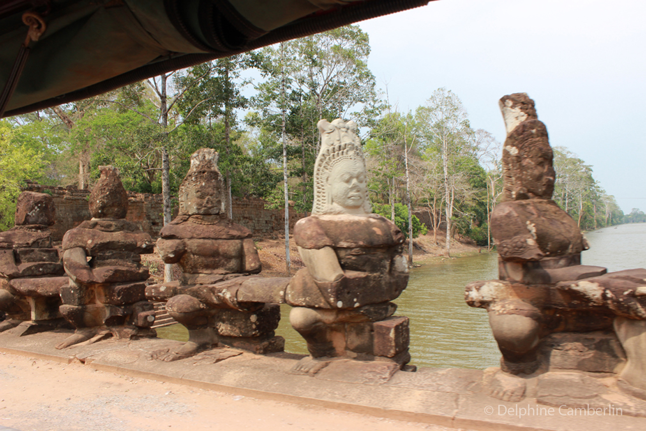 Headless statue at Angkor Wat temples