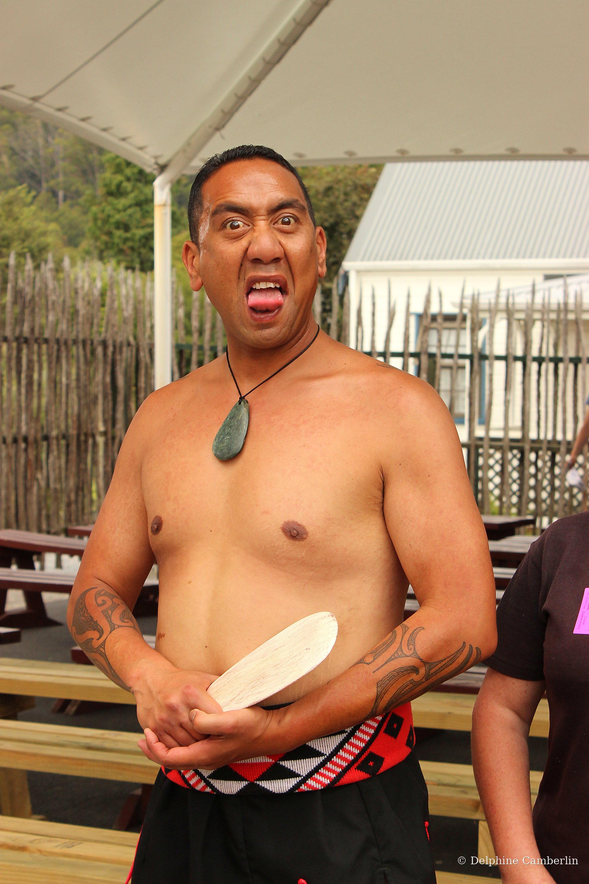 Asking before photographing — Māori cultural performer, New Zealand
