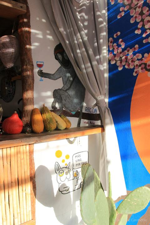 REC.ON Co-living, Vélez-Rubio, Spain – Outdoor kitchen window mural harvest